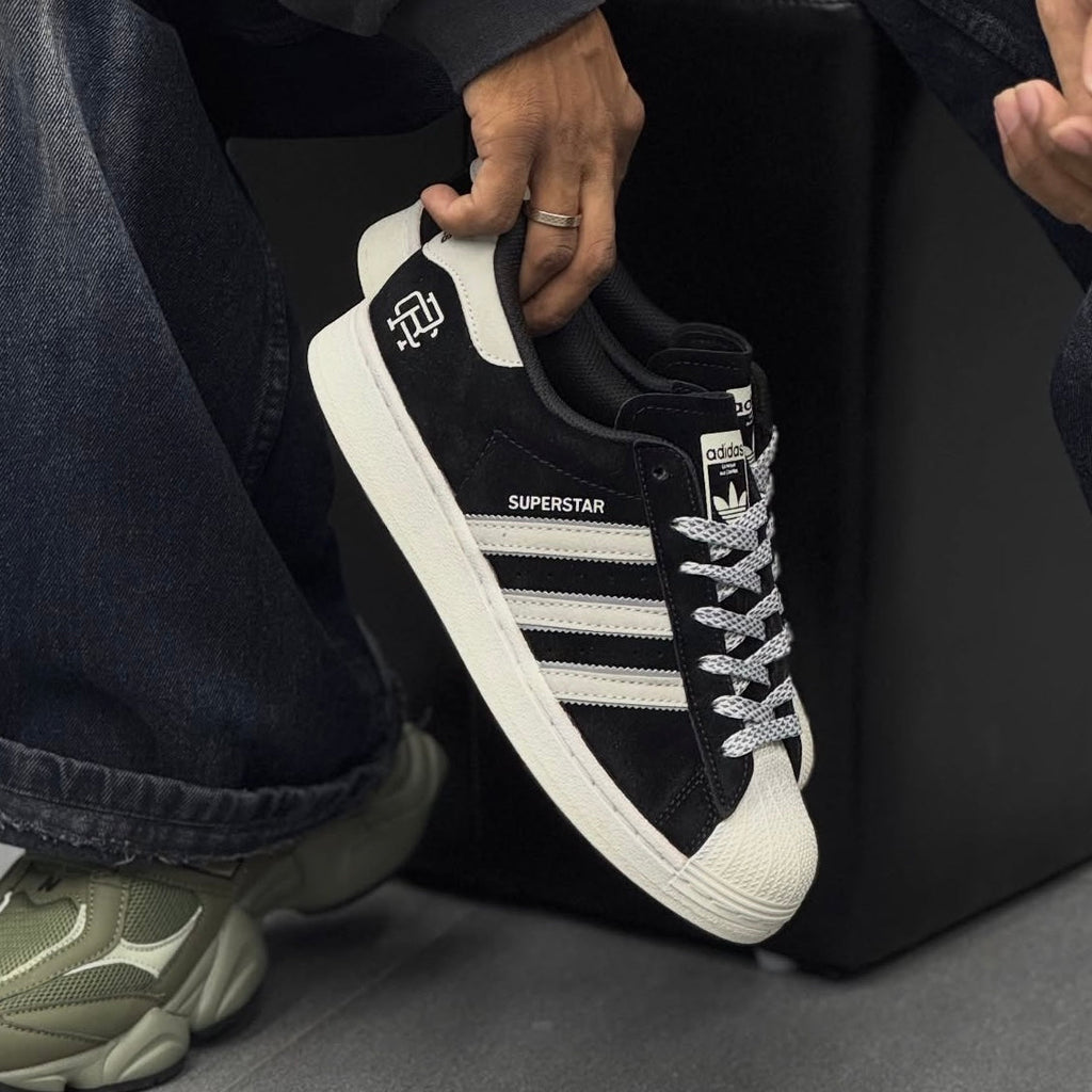 ADIDS SUPERSTAR SUEDE REIGN CHAMP (BLACK/WHITE)