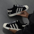 ADIDS SUPERSTAR SUEDE REIGN CHAMP (BLACK/WHITE)
