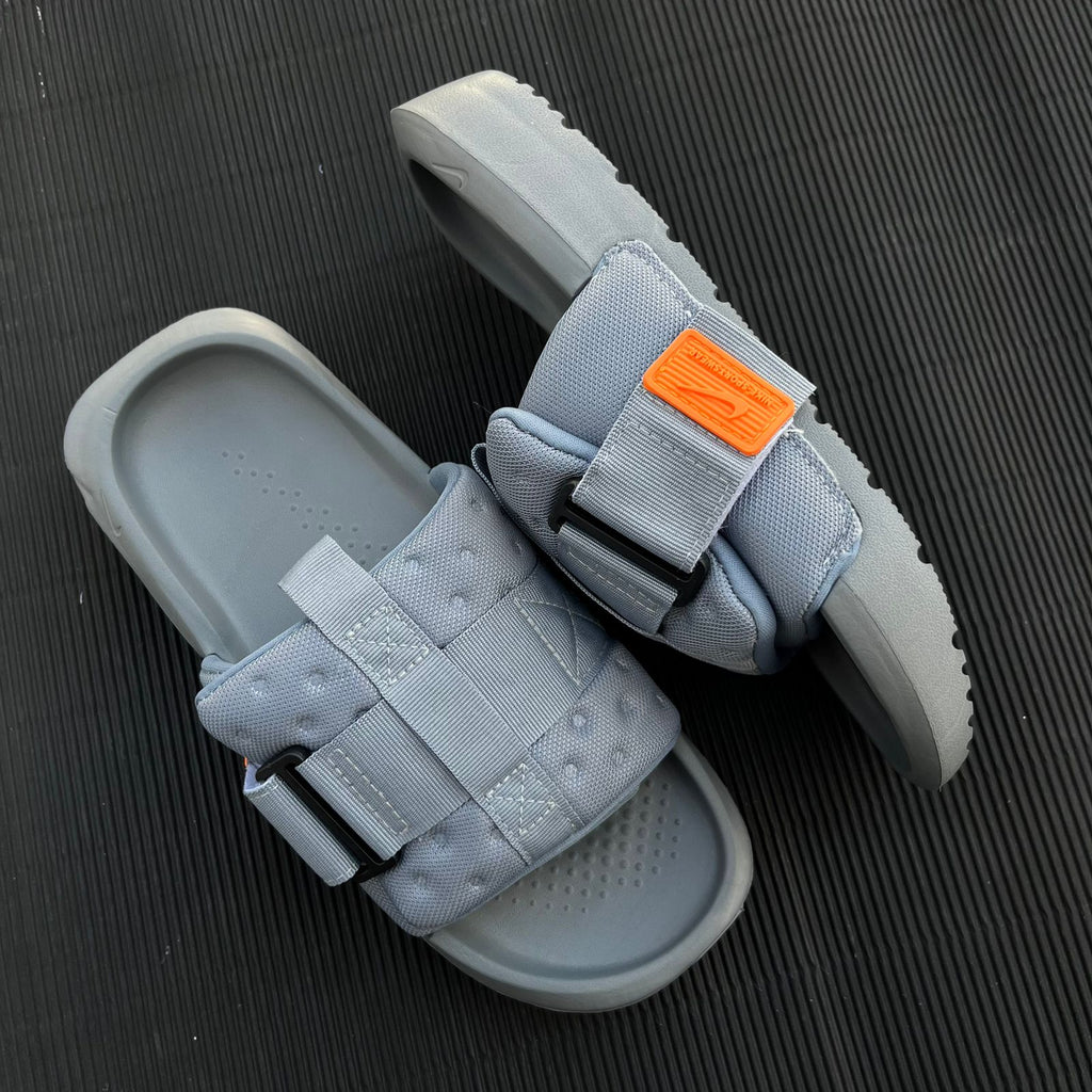 NIK-ASNA-SLIDES-GREY