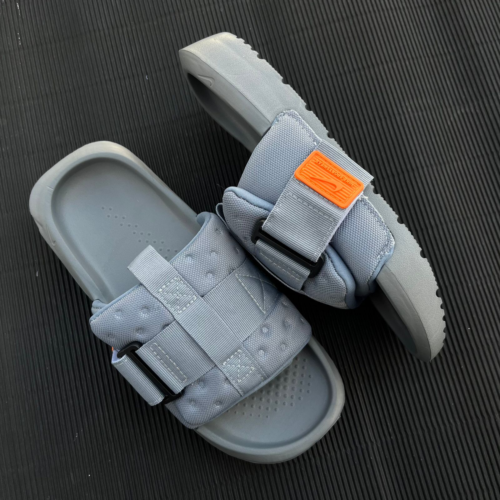 NIK-ASNA-SLIDES-GREY