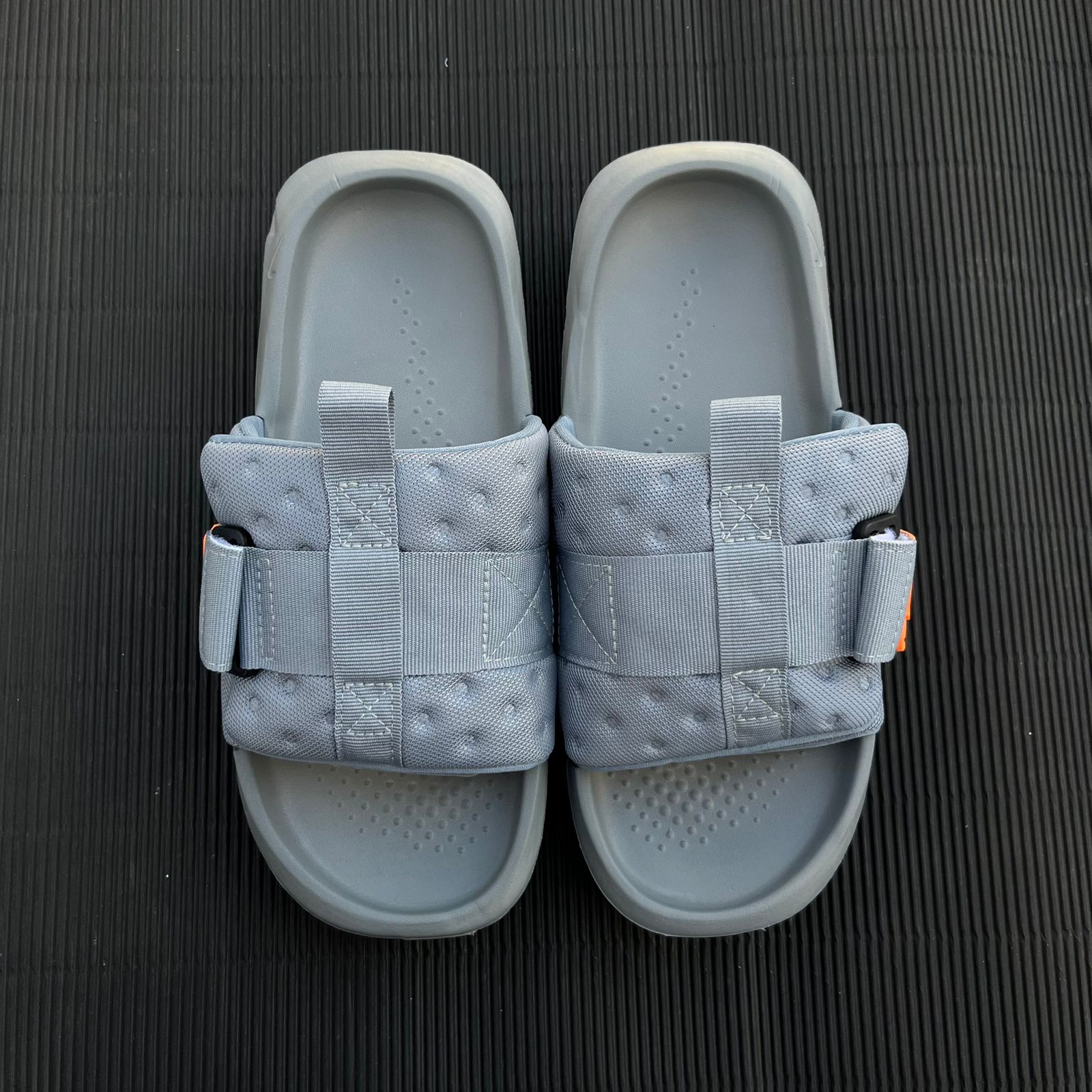 NIK-ASNA-SLIDES-GREY